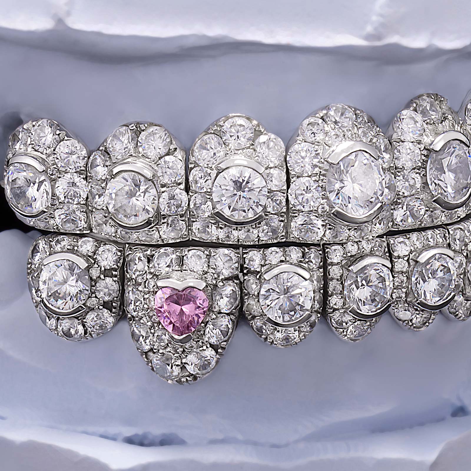 Iced Oval & Pink Heart Diamond Fang Grillz