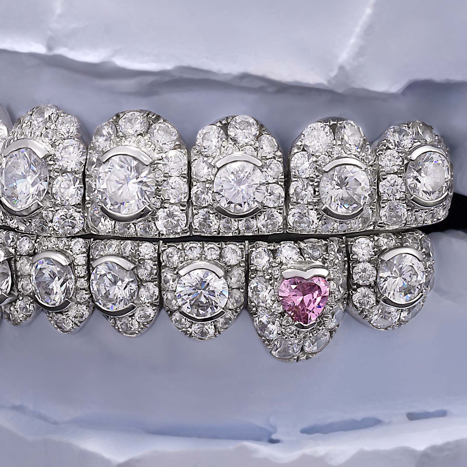 Iced Oval & Pink Heart Diamond Fang Grillz